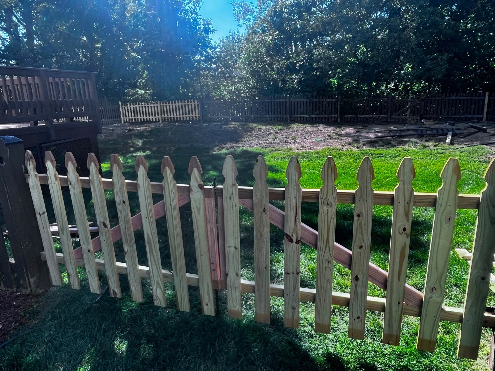 New wood picket fence gate